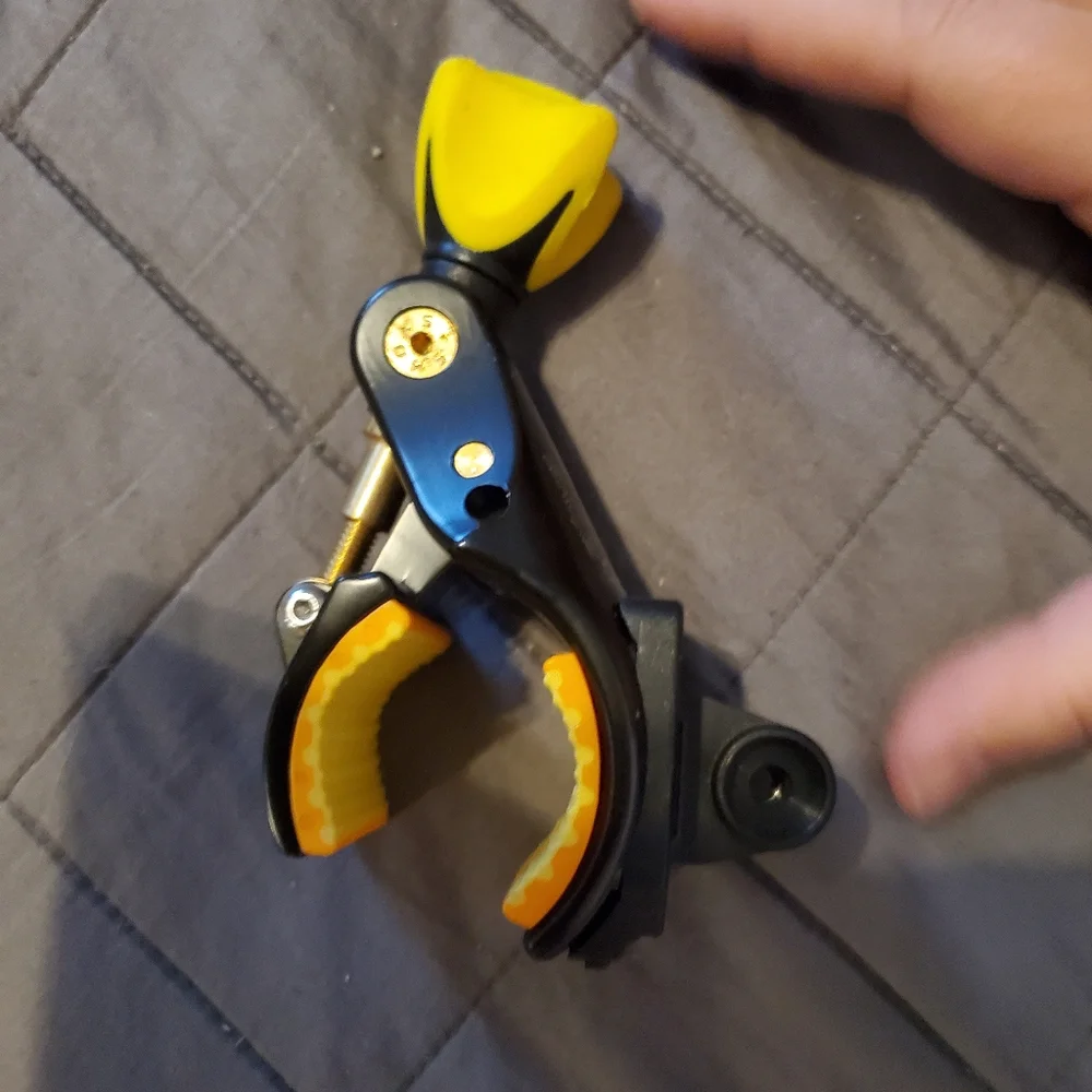 Yellow and Black Camera Tripod Clamp